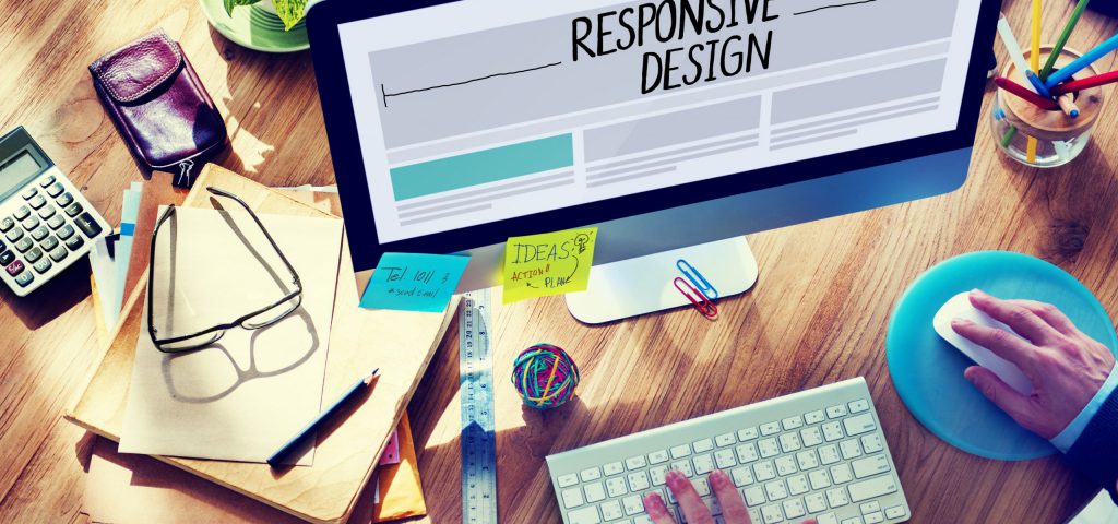 Man Working on a Responsive Web Design Man Working on a Responsive Web Design